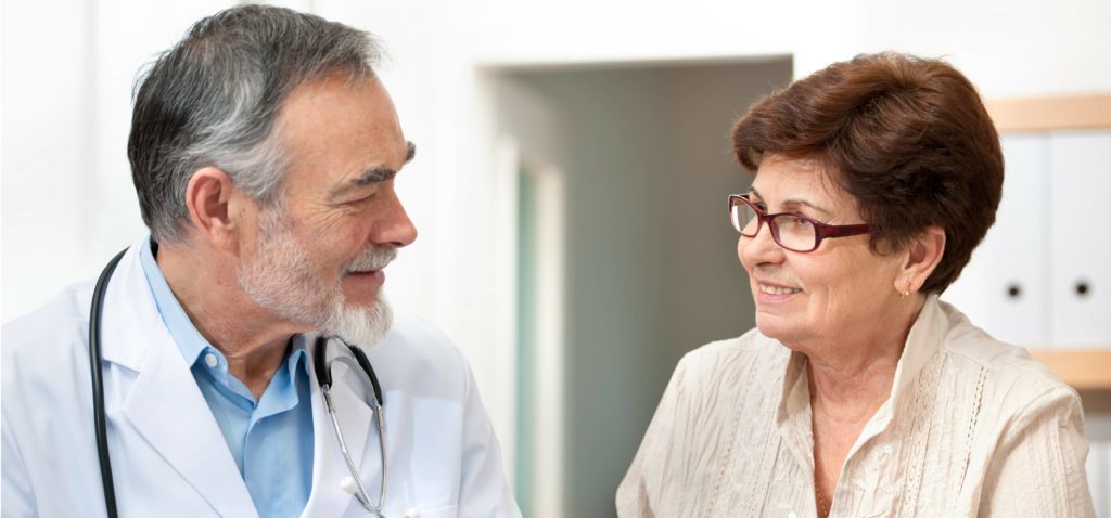 Doctor talking with a patient